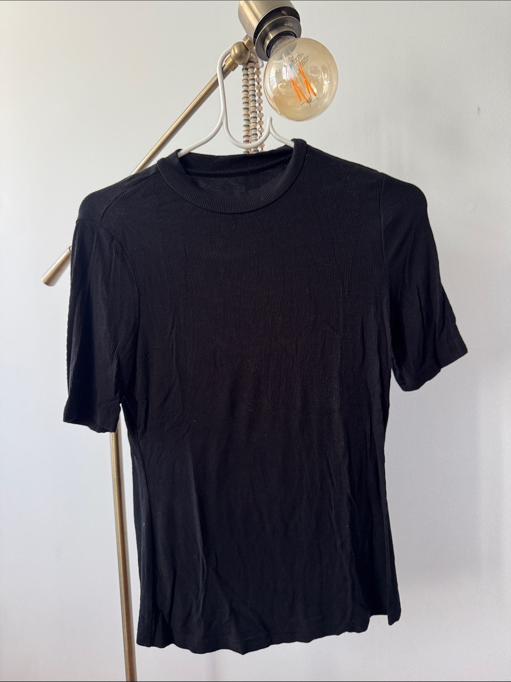 Black mock neck 3/4 inch sleeve ribbed top